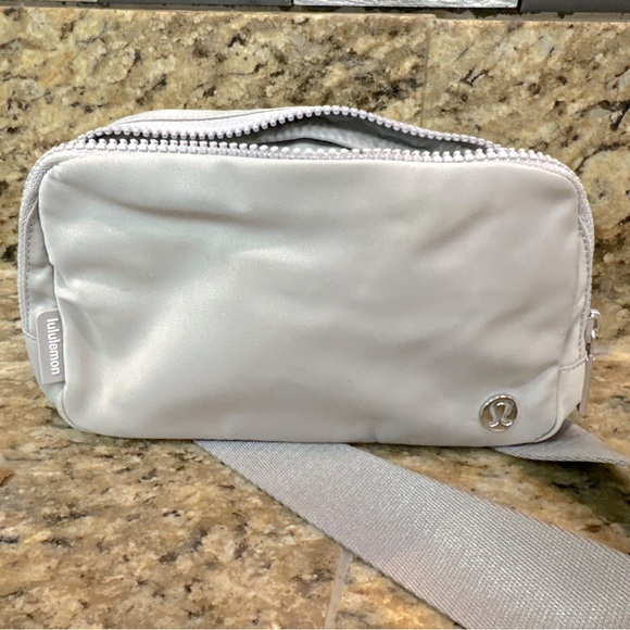 lululemon athletica Handbags - Lululemon everyday belt bag grey/silver New with flaws